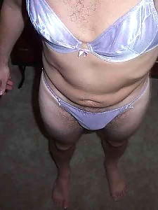 Crossdresser wearing matching panties and bra