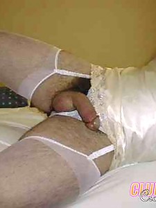 Naughty crossdresser puts on his wifes white panties and bra for you