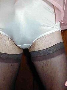 Thigh high stockings on this sexy crossdresser